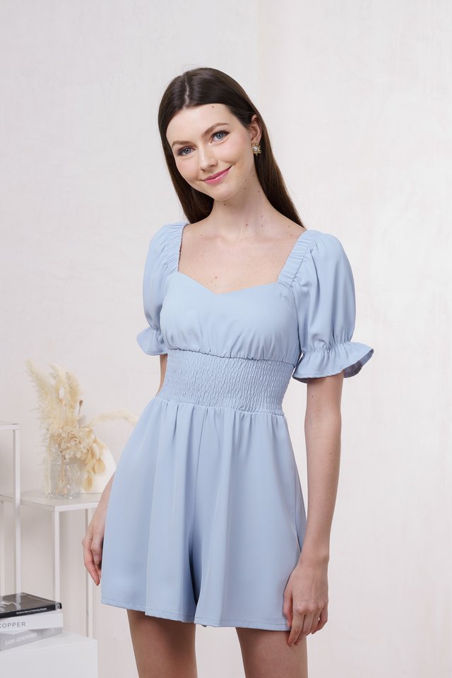 Roberts Smocked Waist Romper In Powder Blue