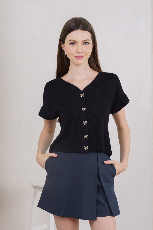 Kamri Ribbon Button Knit Top In Black