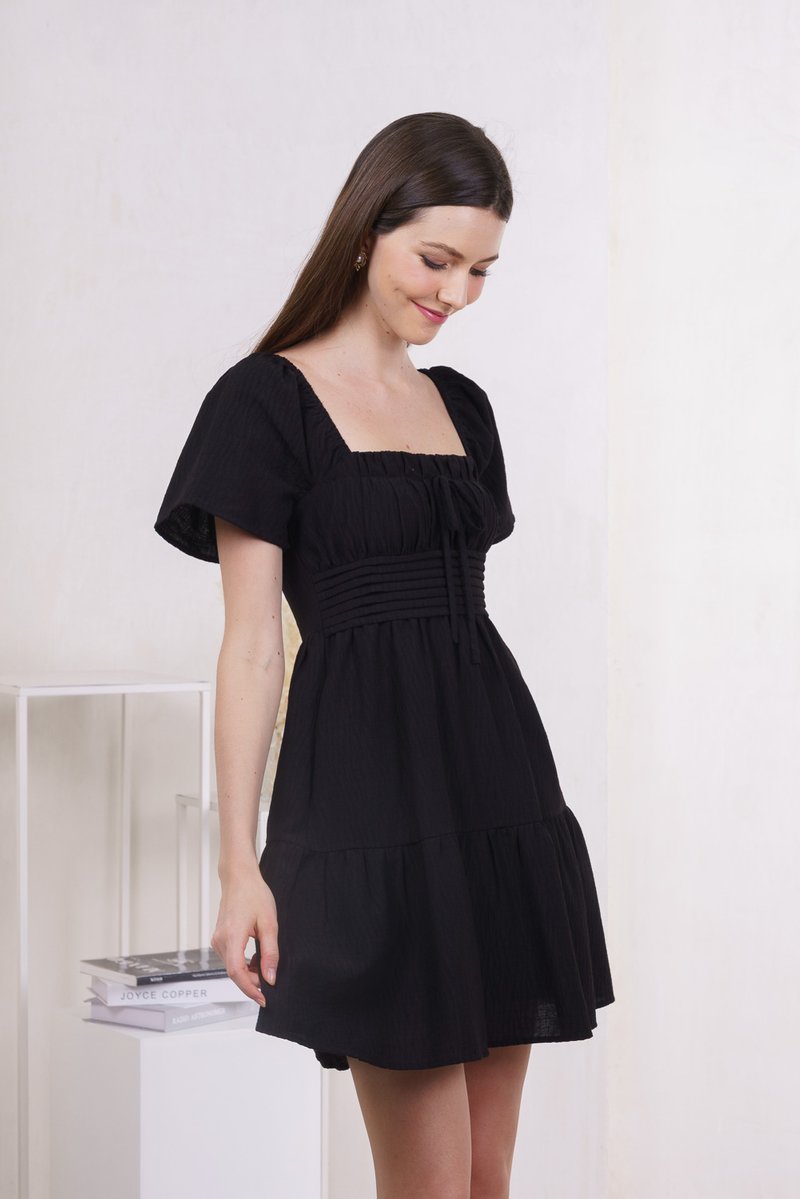 Peachy Textured Ribbon Pleated Dress In Black (XS)