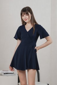 Fika Faux Wrap Dress Romper In Navy (XS)