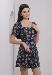 Frost Floral Romper In Navy (XS)