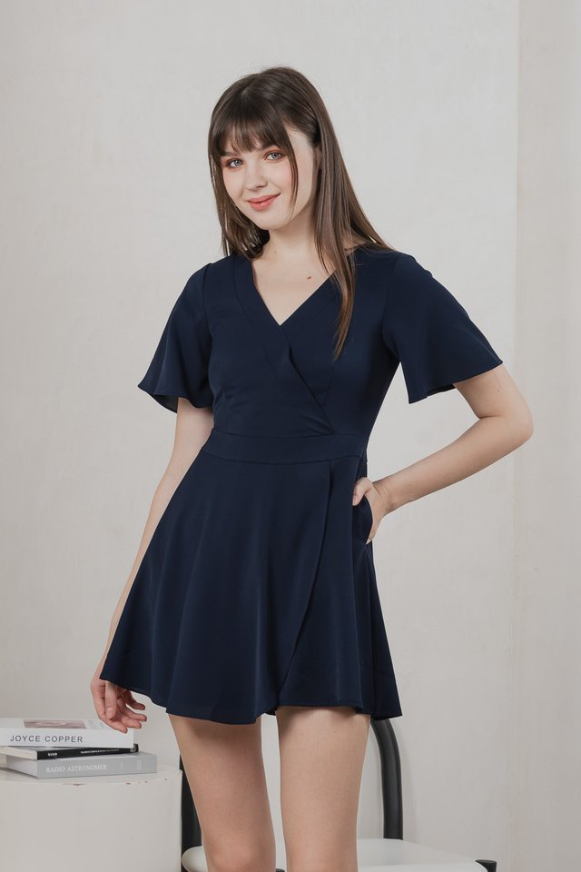 Fika Faux Wrap Dress Romper In Navy