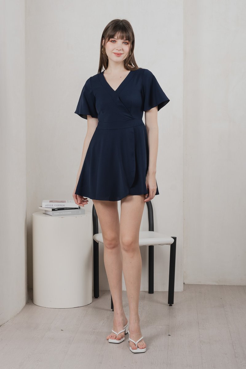 Fika Faux Wrap Dress Romper In Navy (XS)