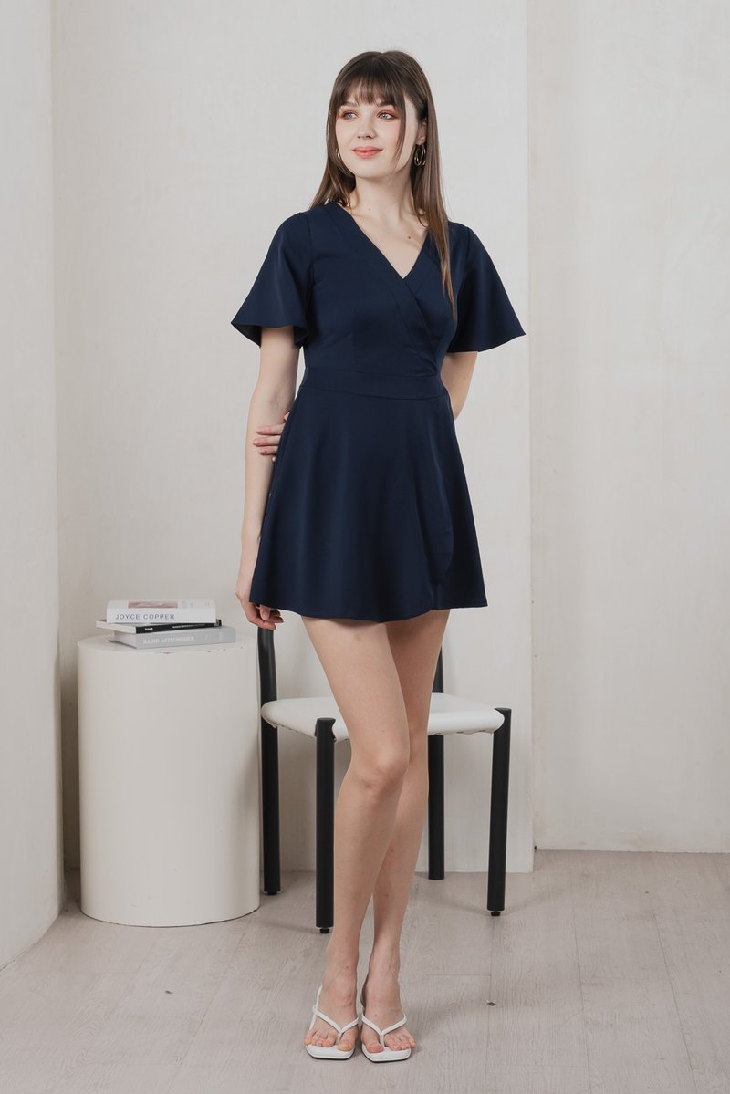 Fika Faux Wrap Dress Romper In Navy (XS)