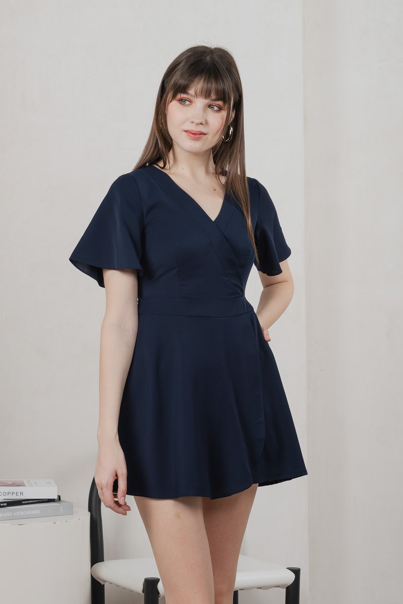 Fika Faux Wrap Dress Romper In Navy (XS)