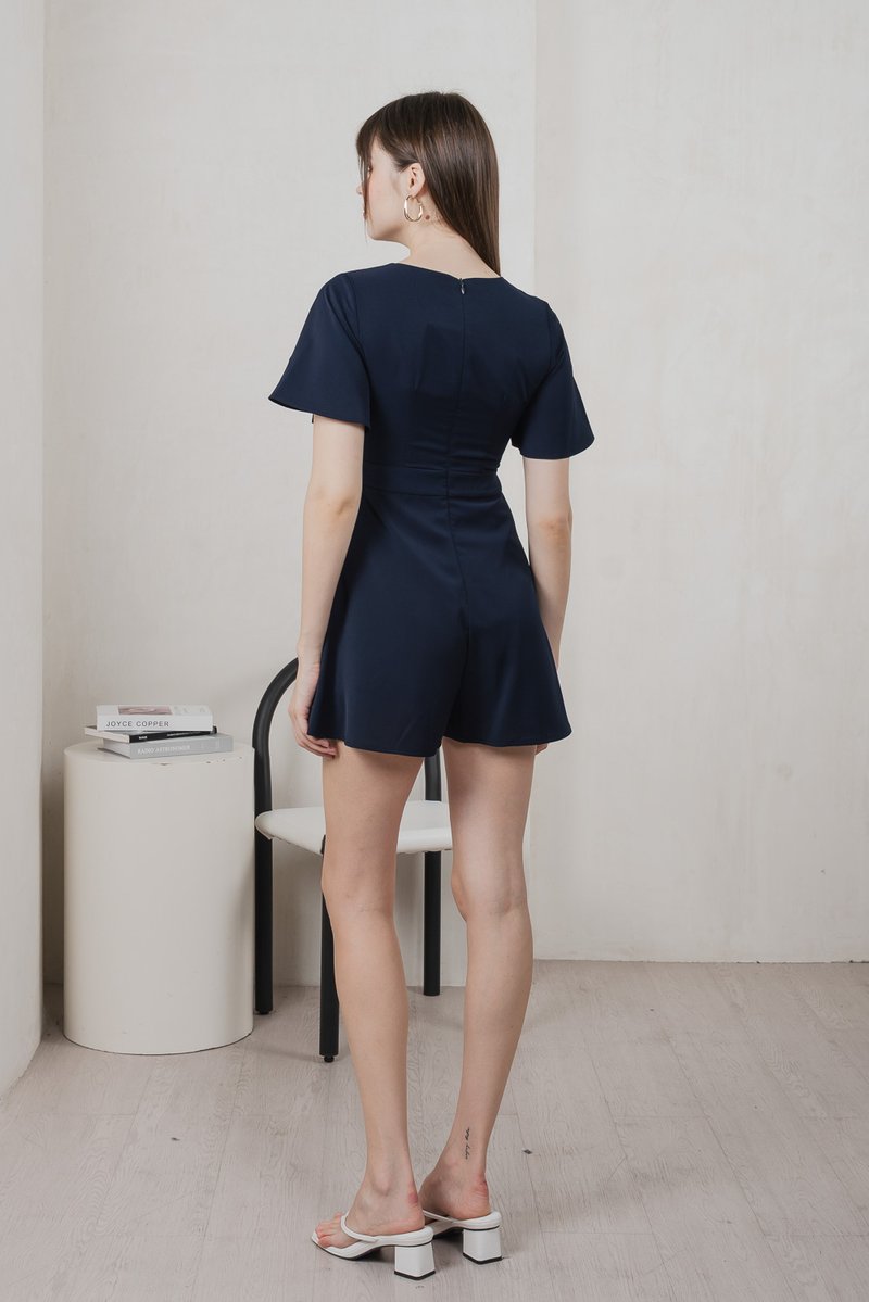 Fika Faux Wrap Dress Romper In Navy (XS)