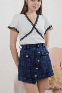 Vega Slant Button Denim Skort in Dark Wash