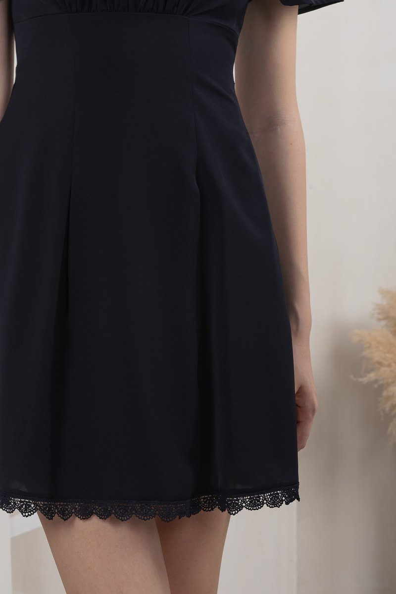 Harmonia Lace Hem Ruched Dress In Navy (XS)