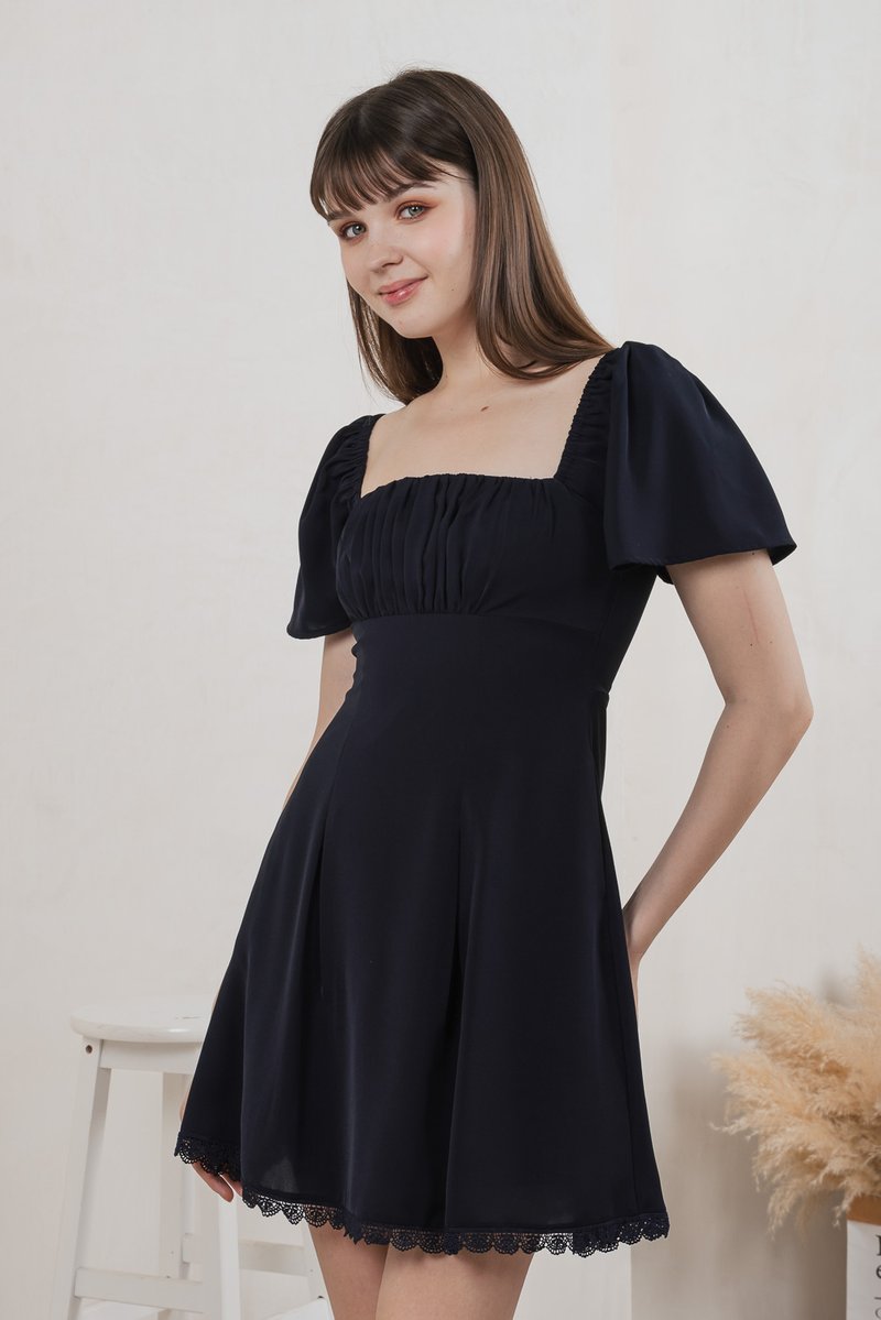 Harmonia Lace Hem Ruched Dress In Navy (XS)