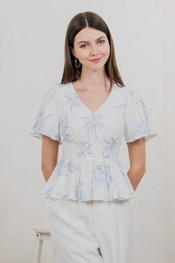 Parisa Printed Smocked Waist Top In Pastel Blue
