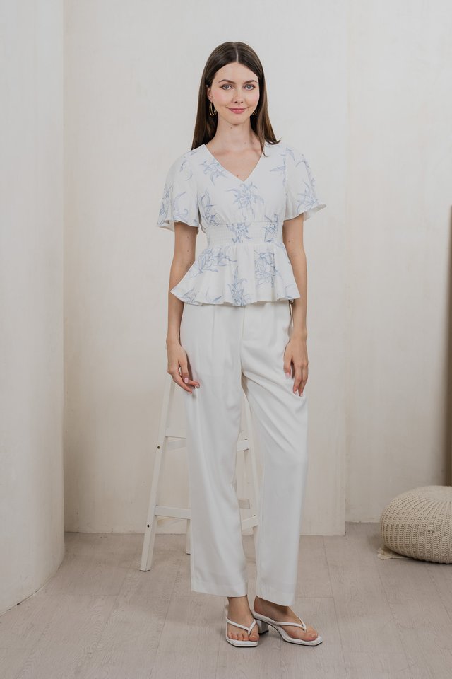 Parisa Printed Smocked Waist Top In Pastel Blue