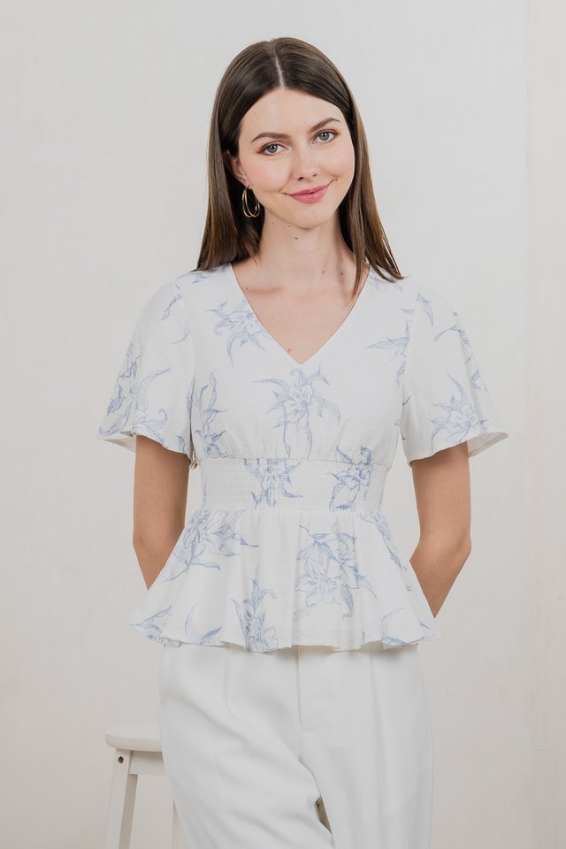 Parisa Printed Smocked Waist Top In Pastel Blue