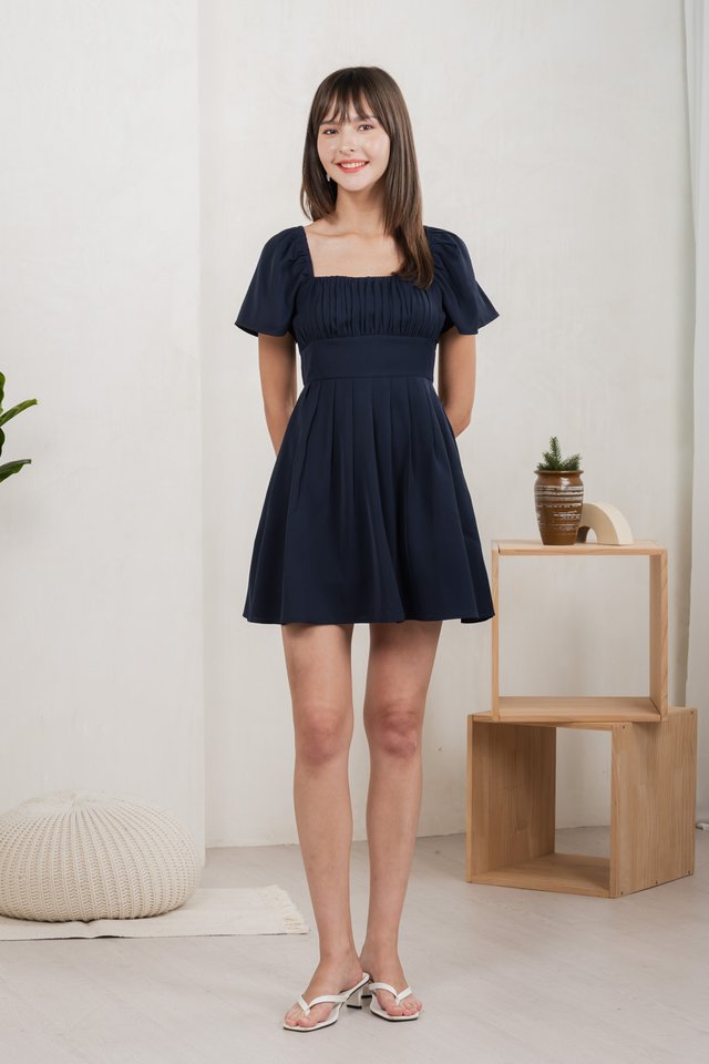Regine Ruched Pleated Dress Romper In Navy