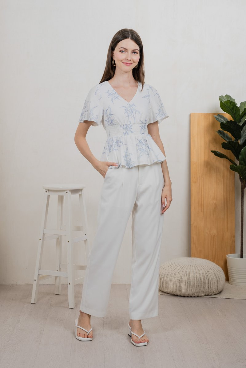 Parisa Printed Smocked Waist Top In Pastel Blue
