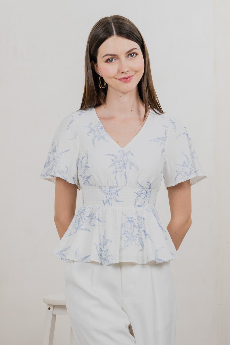 Parisa Printed Smocked Waist Top In Pastel Blue
