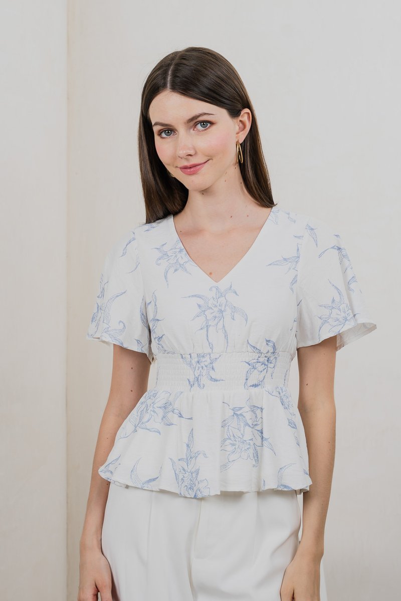 Parisa Printed Smocked Waist Top In Pastel Blue