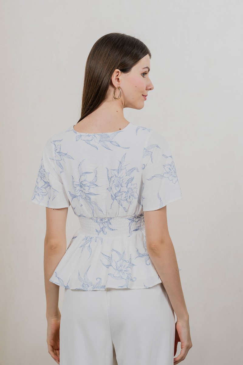 Parisa Printed Smocked Waist Top In Pastel Blue