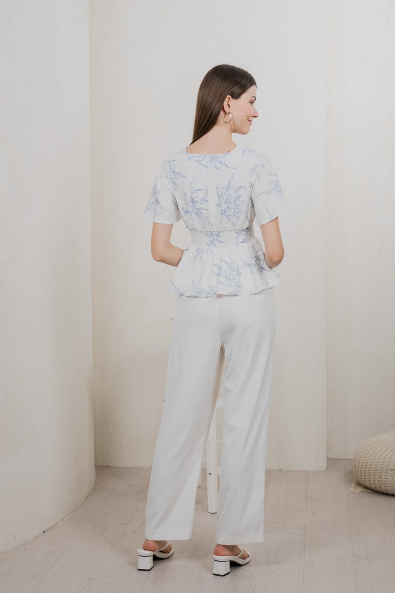 Parisa Printed Smocked Waist Top In Pastel Blue