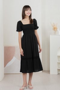 Journey Textured Smocked Midi Dress In Black
