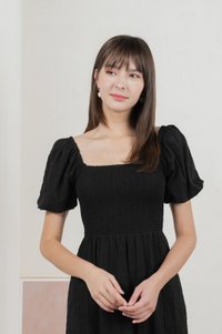 Journey Textured Smocked Midi Dress In Black
