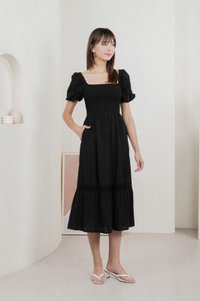 Journey Textured Smocked Midi Dress In Black
