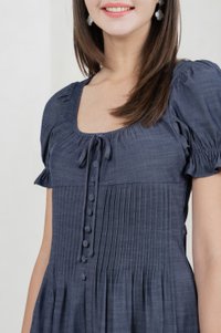 Bonita Ribbon Button Pleated Dress In Midnight Blue