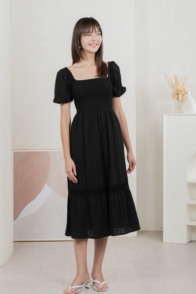 Journey Textured Smocked Midi Dress In Black