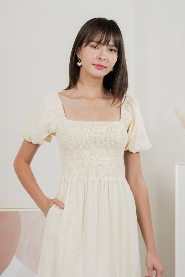 Journey Textured Smocked Midi Dress In Cream