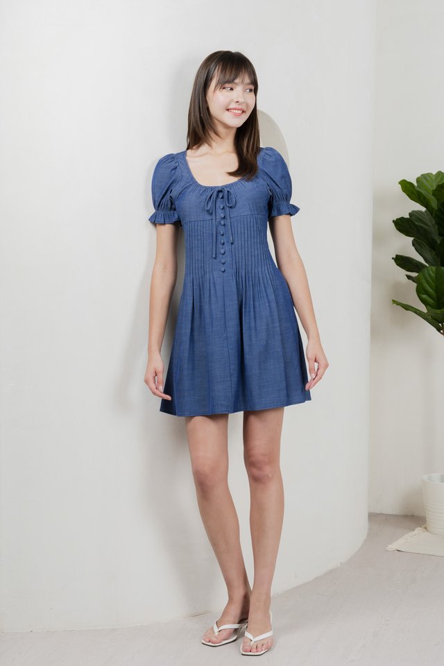 Bonita Ribbon Button Pleated Dress In Denim Blue