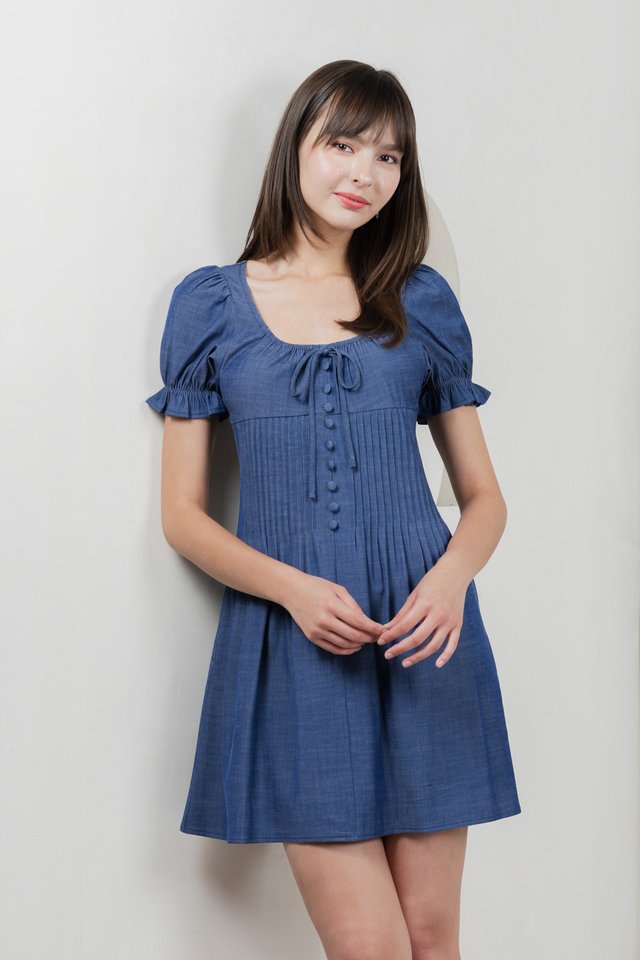 Bonita Ribbon Button Pleated Dress In Denim Blue