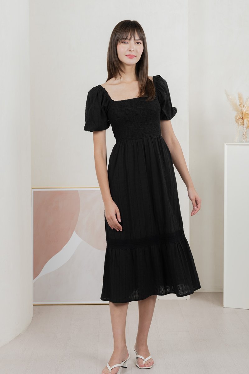 Journey Textured Smocked Midi Dress In Black