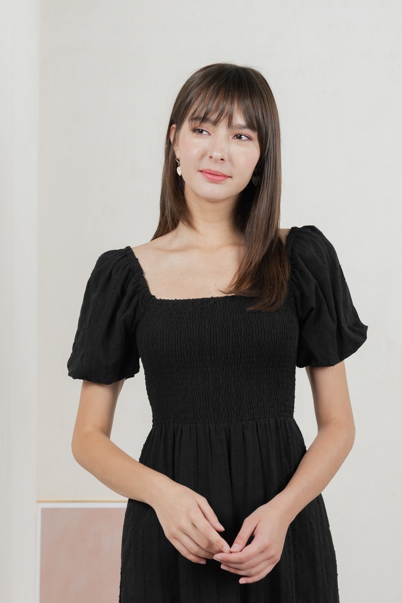 Journey Textured Smocked Midi Dress In Black