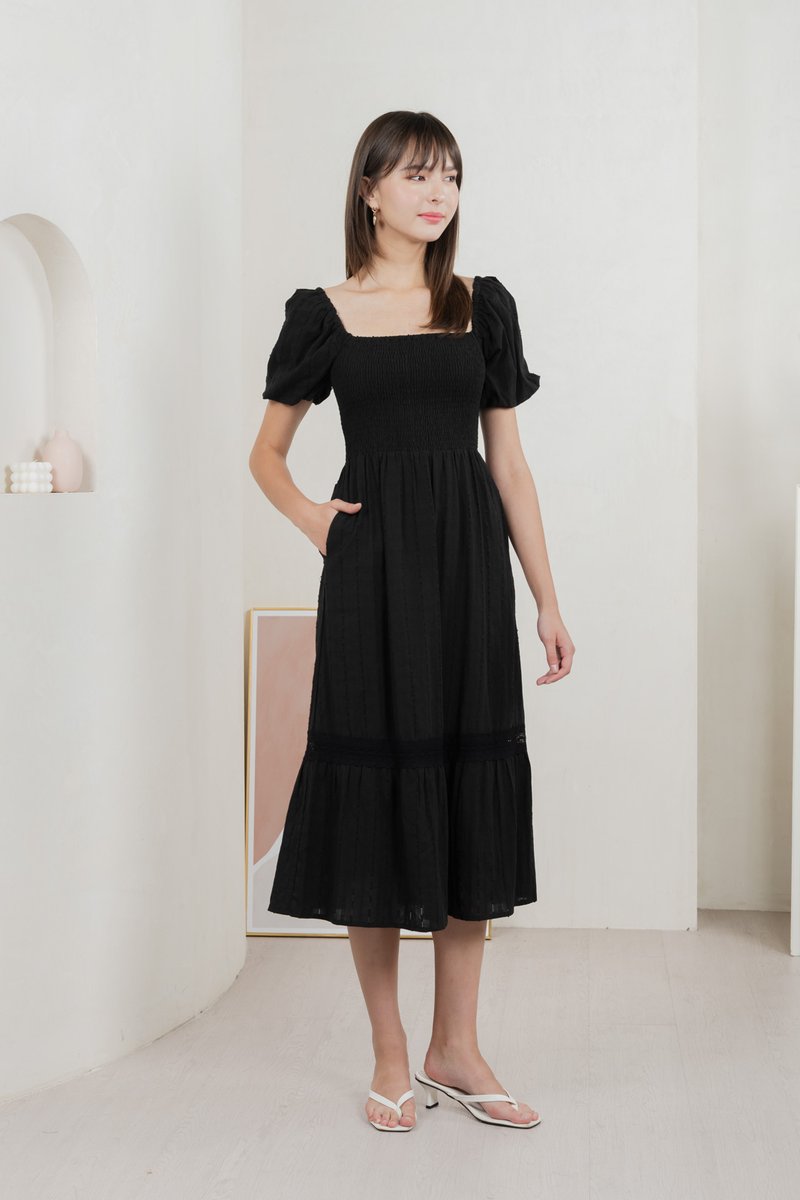 Journey Textured Smocked Midi Dress In Black