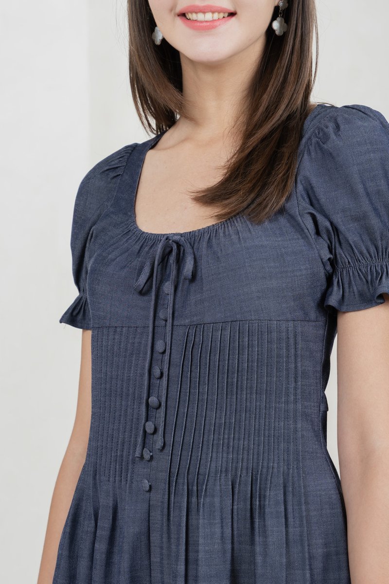 Bonita Ribbon Button Pleated Dress In Midnight Blue