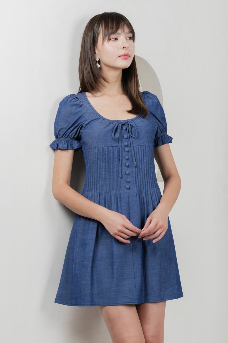 Bonita Ribbon Button Pleated Dress In Denim Blue
