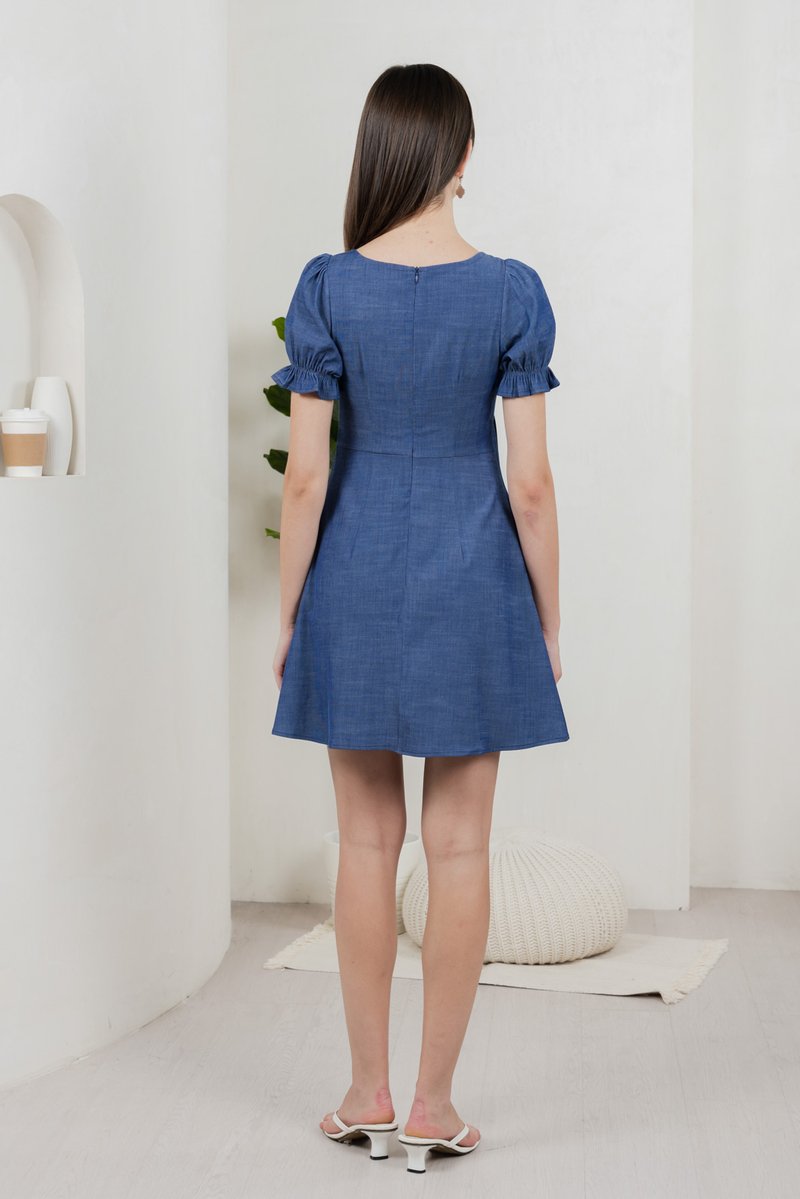 Bonita Ribbon Button Pleated Dress In Denim Blue