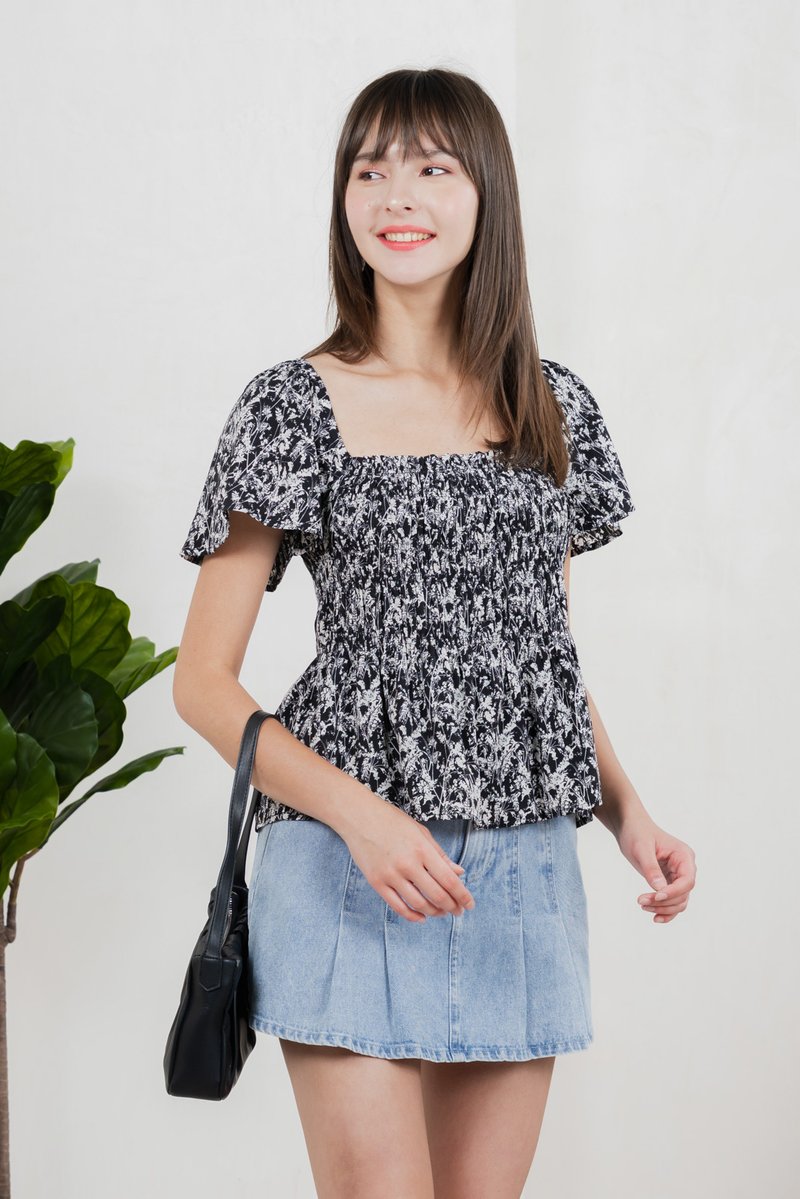 Kismet Printed Smocked Top In Black