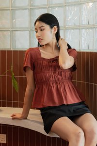 Mari Ruched Ribbon Top In Rust