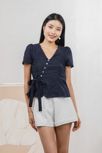 Raye Ribbon Faux Wrap Top In Navy