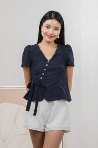 Raye Ribbon Faux Wrap Top In Navy