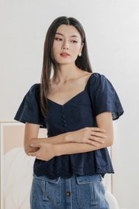 Brinia Ribbon Eyelet Button Top In Navy