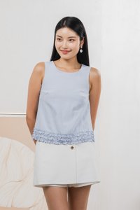 Tessa Ruffles Shift Top In Ice Blue
