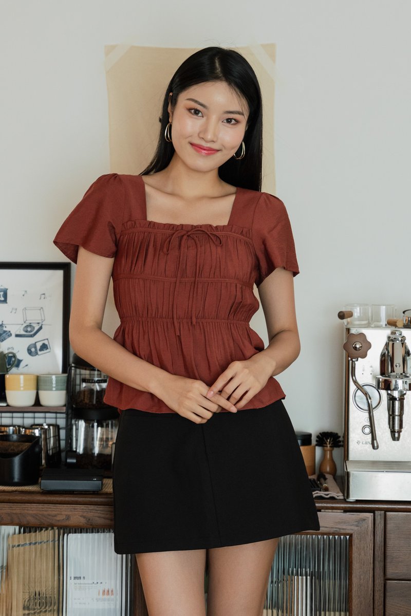 Mari Ruched Ribbon Top In Rust