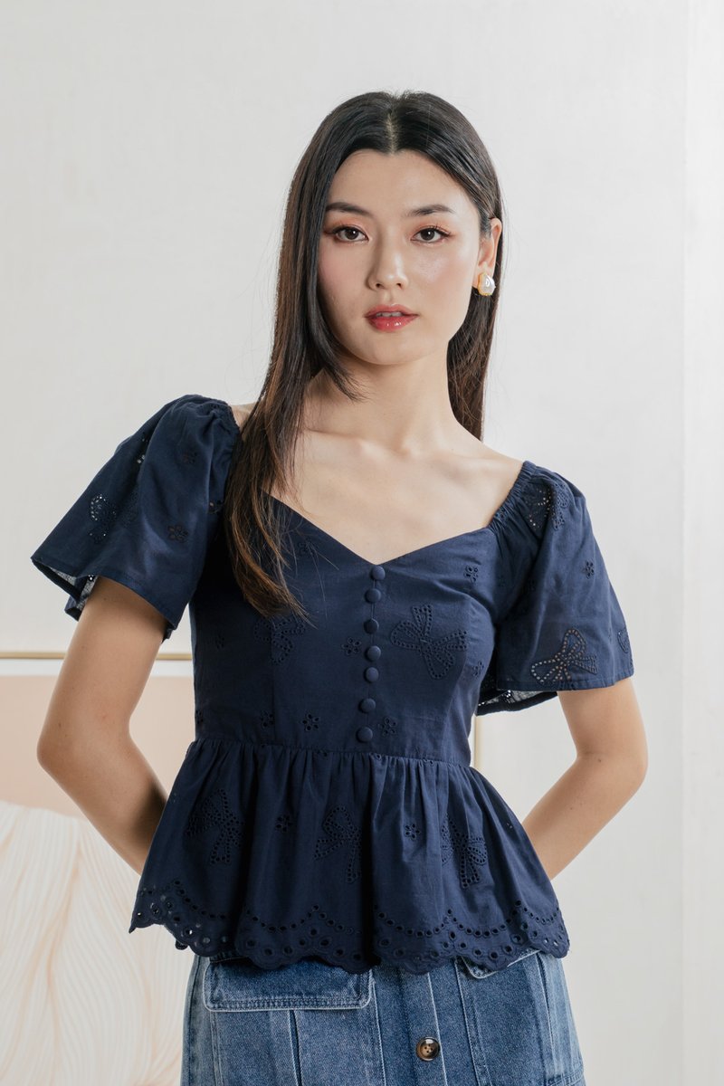 Brinia Ribbon Eyelet Button Top In Navy