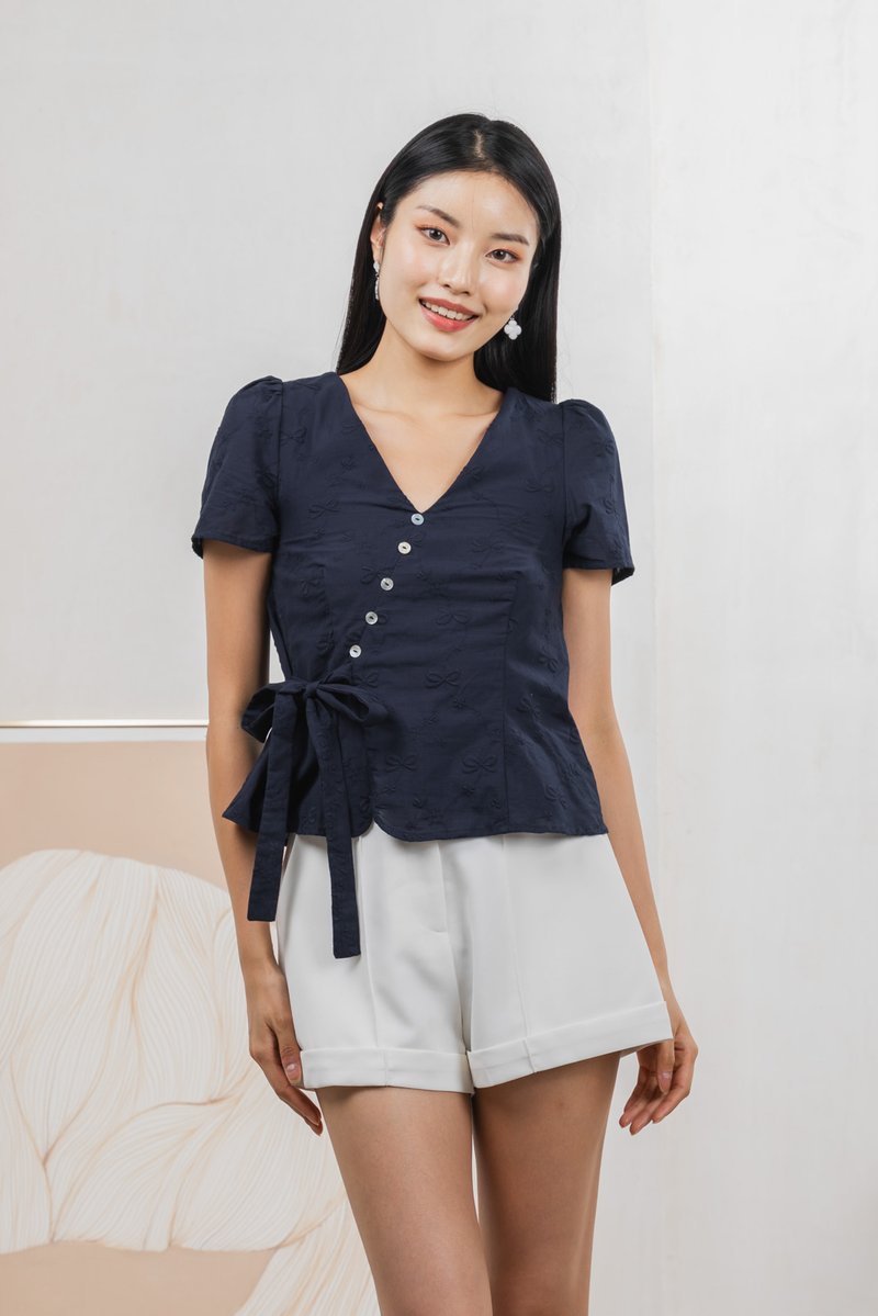 Raye Ribbon Faux Wrap Top In Navy
