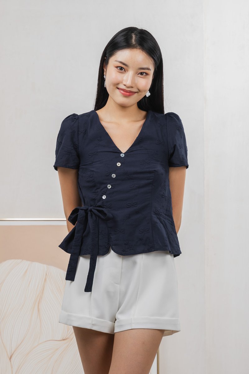 Raye Ribbon Faux Wrap Top In Navy