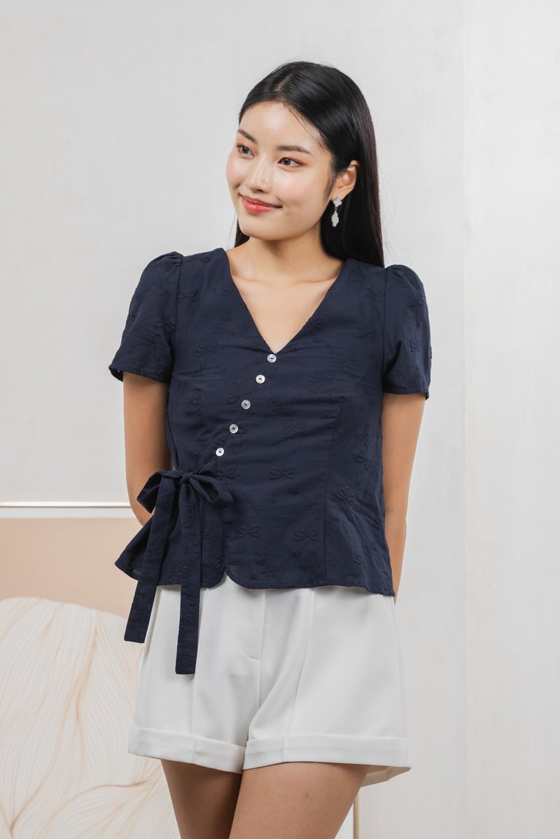 Raye Ribbon Faux Wrap Top In Navy