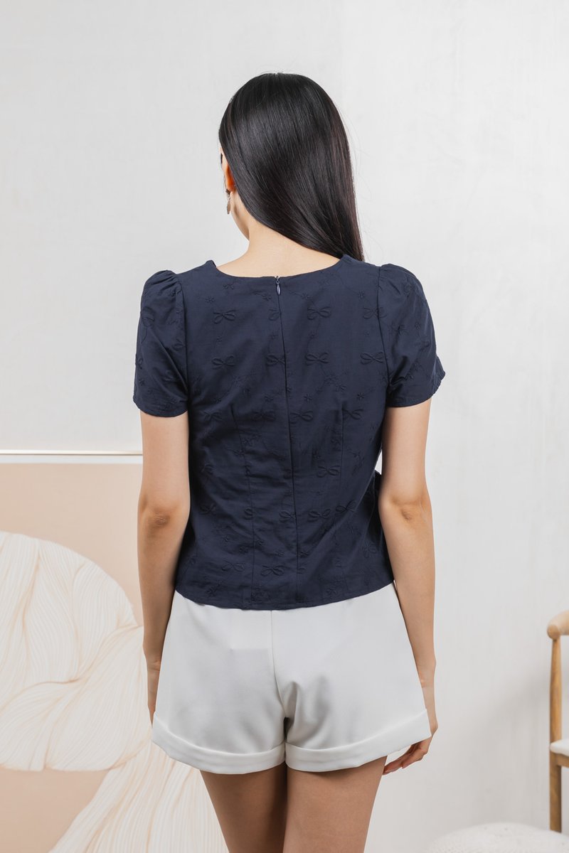 Raye Ribbon Faux Wrap Top In Navy