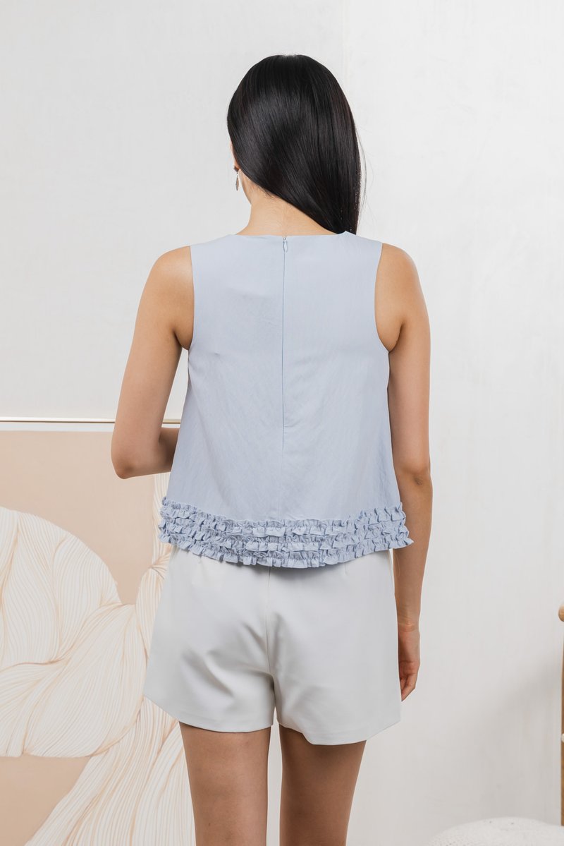 Tessa Ruffles Shift Top In Ice Blue