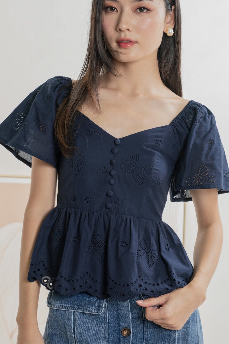 Brinia Ribbon Eyelet Button Top In Navy